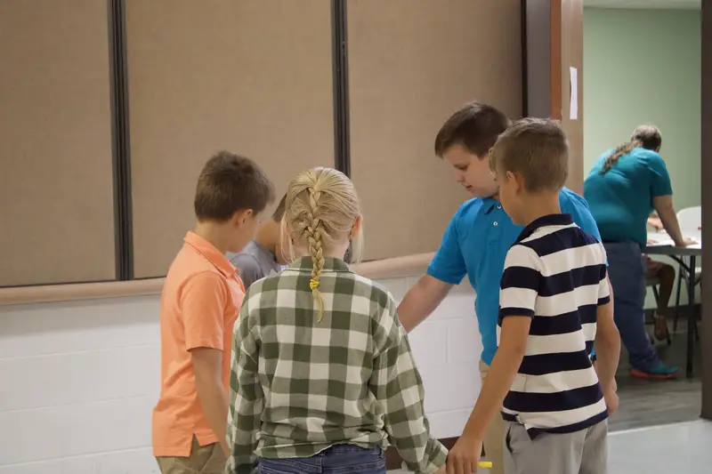Children praying together