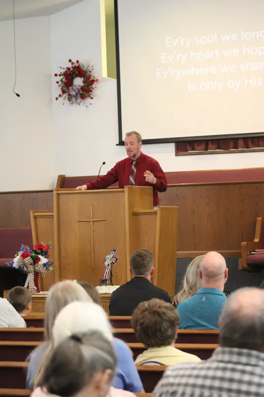 Pastor preaching to congregation